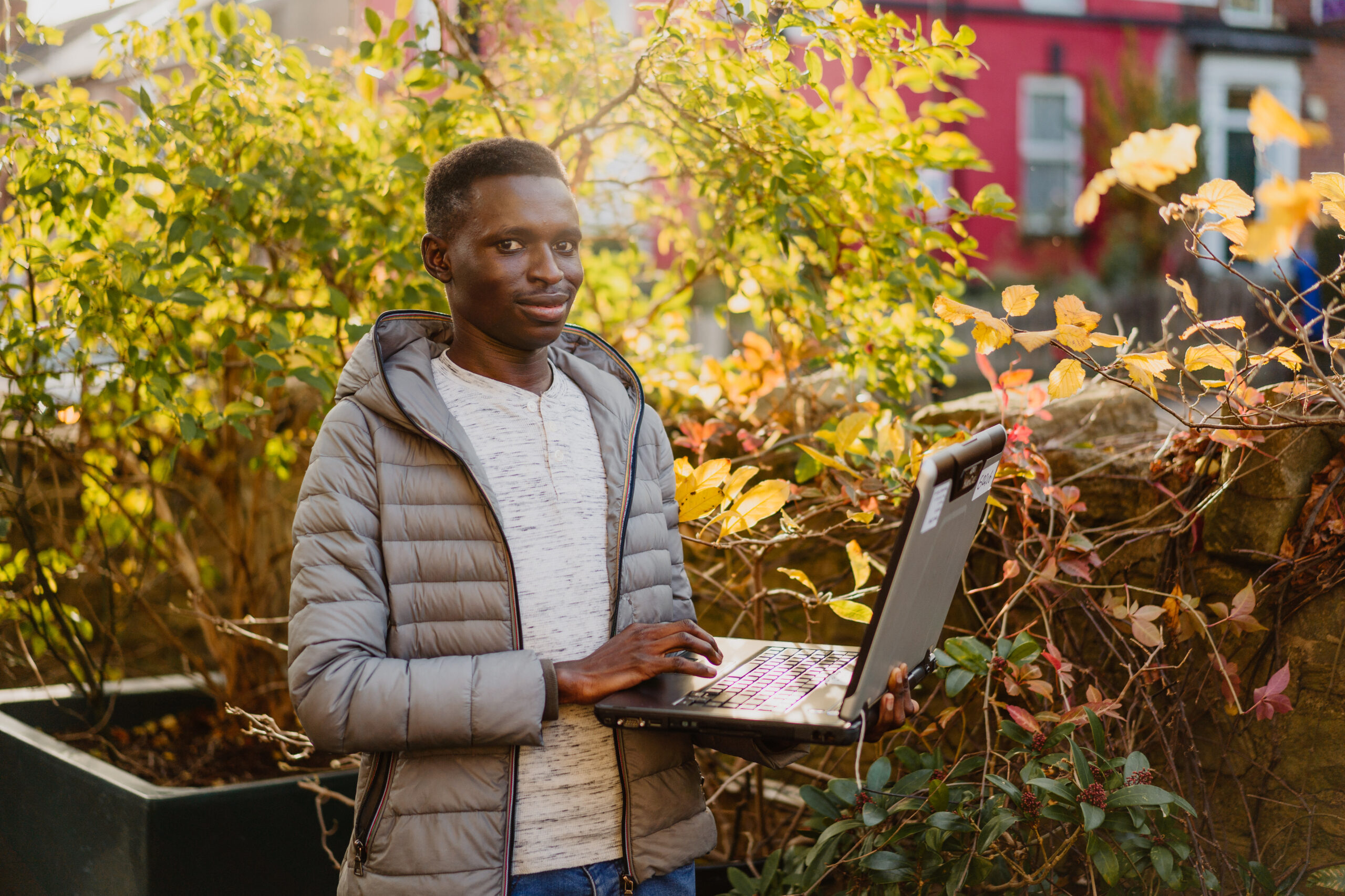 A man holding a laptop